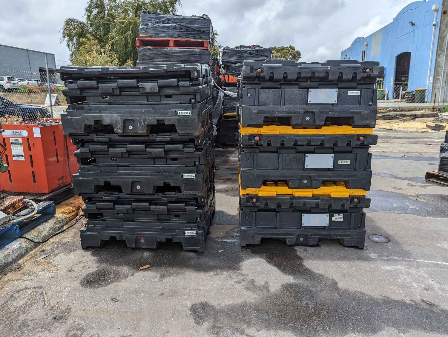 Collapsed and stacked BTS Containers ready for re-deployment to customer sites